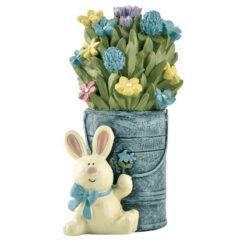 Easter bunny sitting beside tin can